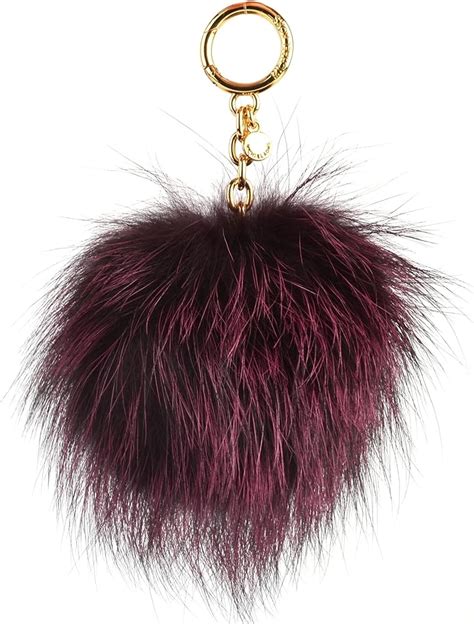 michael michael kors genuine fox fur pompom key charm|Michael Kors Dyed Black Genuine Fox Fur Pom Pom Keychain .